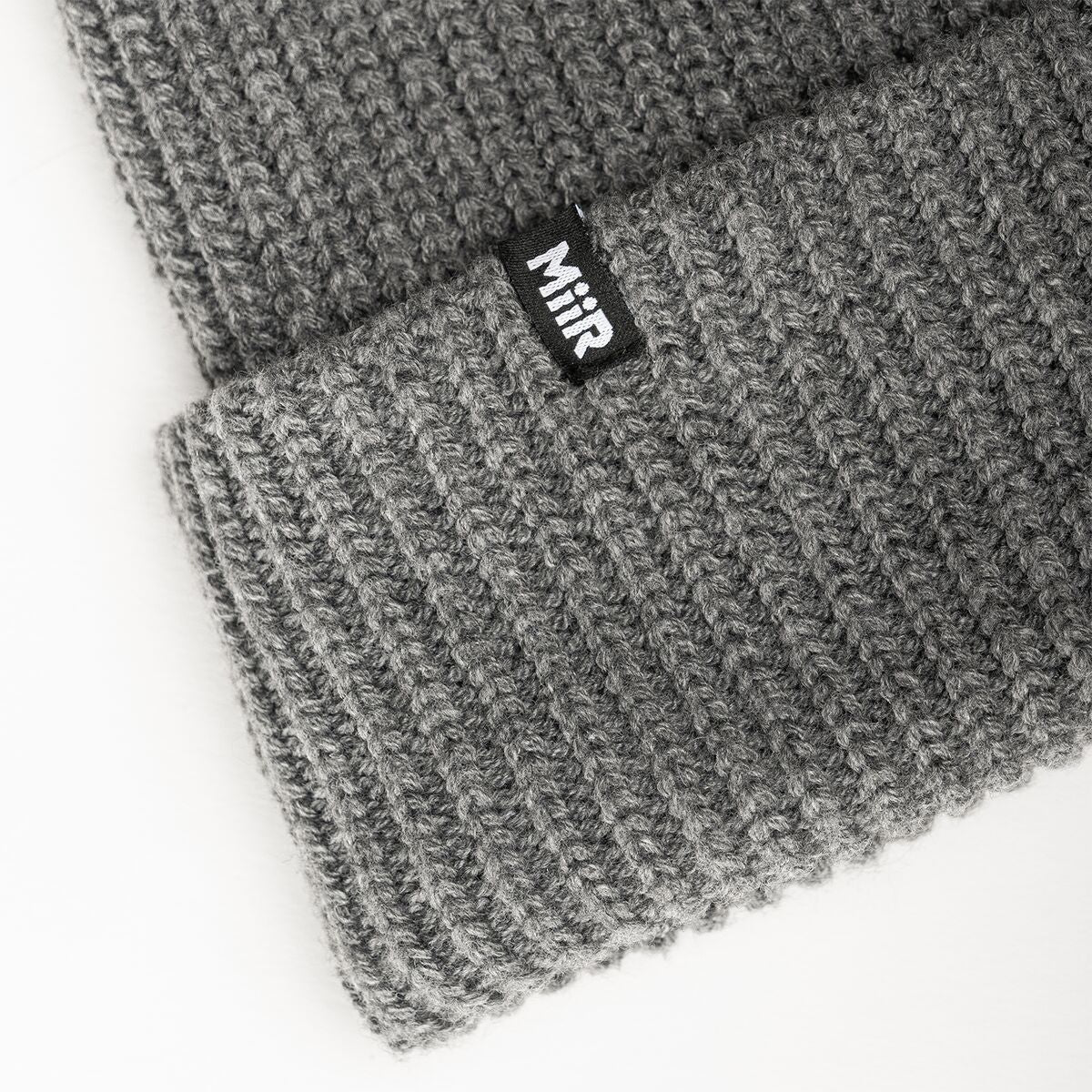 jodie-williams-beanie-s6 WebPDP-RecycledPolyRibBeanie_Studio_TagDetail_GrayHeather__BNE002400OS.jpg